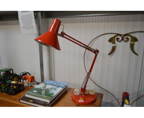 An angle poise style lamp