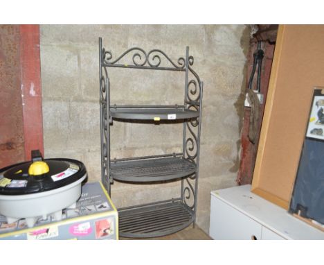 A metal three tier plant stand 