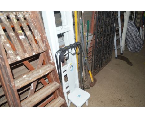 A child's chair; and a luggage rack; and an extending wooden ladder 