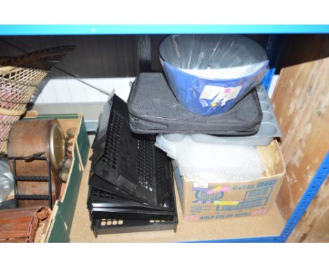 A box of bubble wrap; paper trays; a lamp shade etc