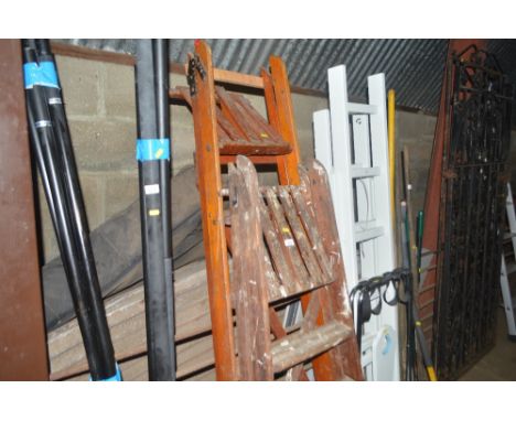 Two wooden step ladders 