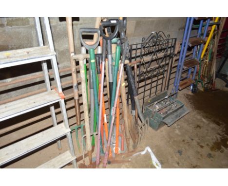 A large quantity of long handled gardening tools 