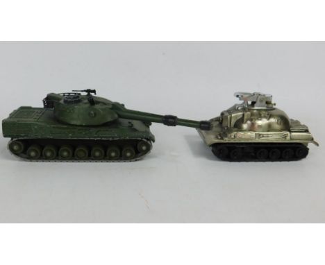 Two tank figures, to include a Dinky Toys Leopard tank and a novelty tank lighter.