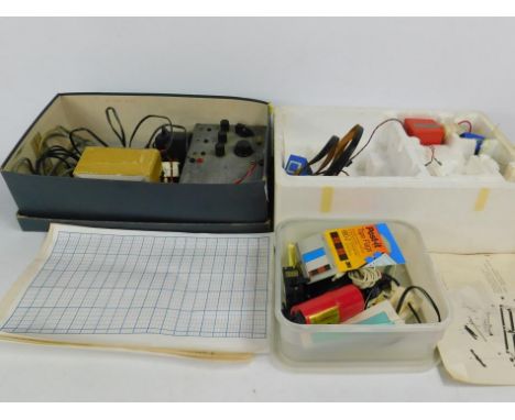 Model boat related electronics, to include radio control kit, battery charger for model boats, and a box of small tools, etc.