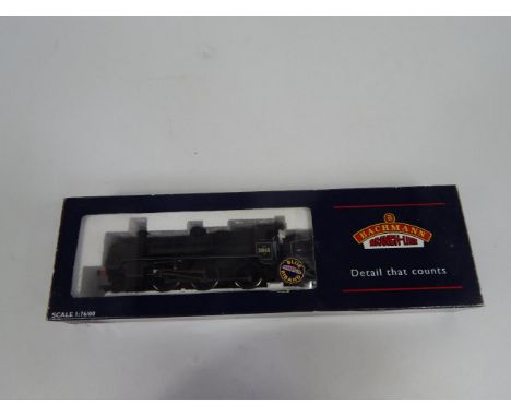 A Bachmann OO-gauge 1:76 locomotive no. 31860 and tender, 5cm high, (boxed).