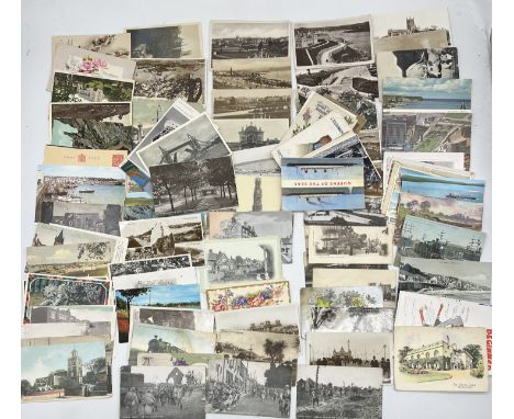 A collection of vintage postcards including some showing the army at the front of the Somme