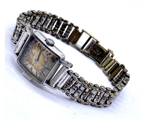 A vintage ladies stainless steel square faced Omega watch - face foxed but watch appears to be working