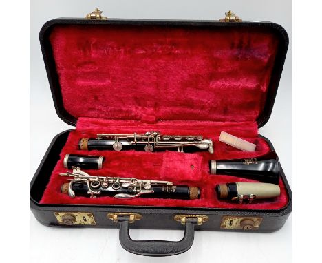 A cased vintage Boosey & Hawkes clarinet.
