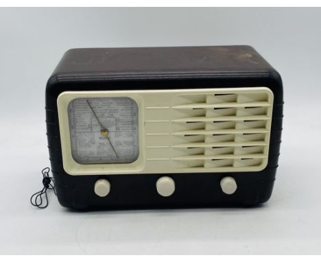 A vintage Art Deco Bakelite cased "Ultra" T.401 radio, with white grill and knobs - untested