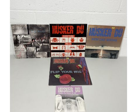 A collection of Hûsker Dû / Husker Du vinyl records including albums New Day Rising, Everything Falls Apart (red, white and b