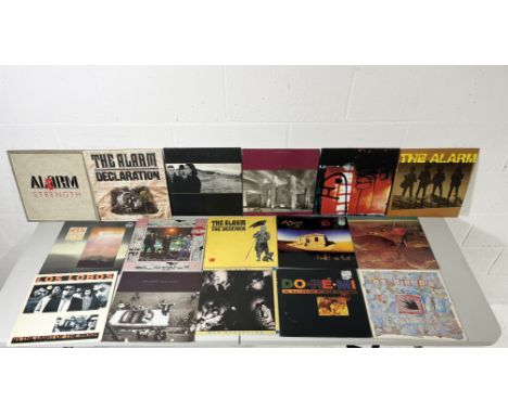 A large collection of 12" vinyl records including U2 The Unforgetable Fire & The Joshua Tree and 12" single The Fly -The Men 