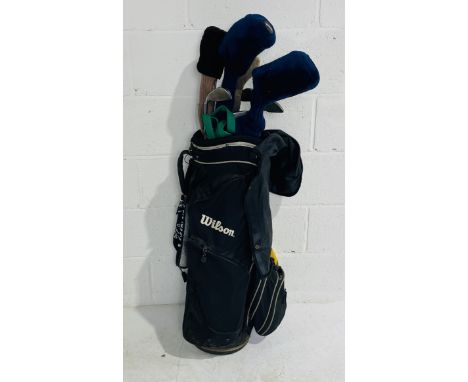 A set of vintage Ping Eye 2 golf clubs including four driving woods, irons 3,5,6,7,8,9 and pitching wedge, along a Slazenger 