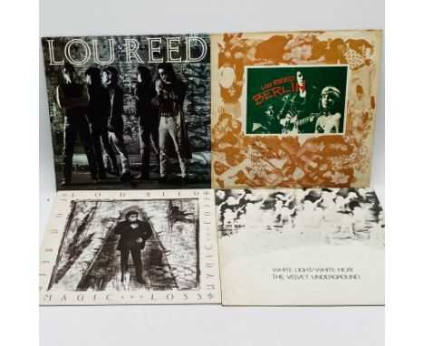 Three Lou Reed 12" vinyl albums including New York, Berlin & Magic & Loss, along with The Velvet Underground White Light/Whit