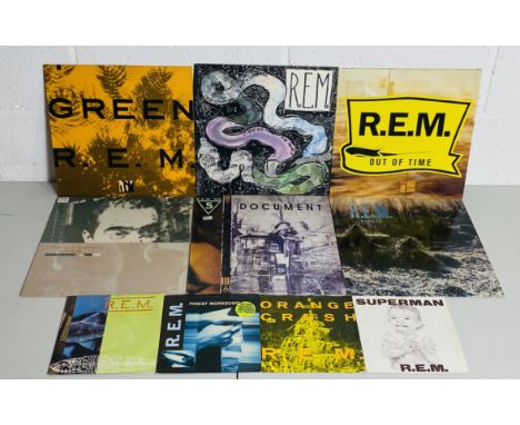 A collection of R.E.M 12" & 7" vinyl records including albums Out of Time, Document, Murmur, Lifes Rich Pageant, Green, Recko