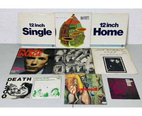 A collection of P.I.L (Public Image Limited) 12", 10" & 7" vinyl records including Happy?, Public Image first issue (albums) 
