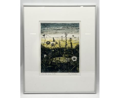 A framed limited edition lithograph "The Grass Cutter" by R.J. Woodrow signed, titled and numbered by the artist 4/120 - over
