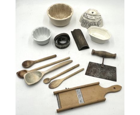 A collection of various antique and other kitchenalia including jelly moulds, pastry cutters, spoons etc.