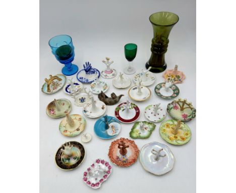A collection of assorted porcelain ring trees, to include possibly a Herend decorated ring tree, etc.