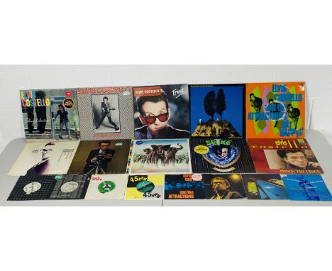 A collection of Elvis Costello 12" & 7" vinyl records including Taking Liberties, My Aim Is True, Trust, Goodbye Cruel World,