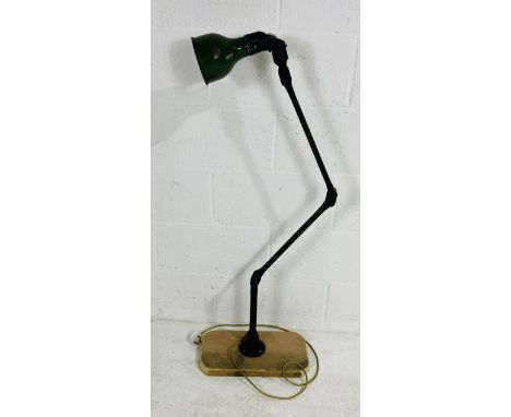 A large vintage "Mek-Elek" industrial machinist anglepoise lamp, mounted on wooden plinth