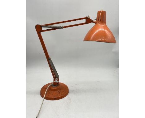 A vintage Thousand & One Lamps Ltd orange anglepoise lamp