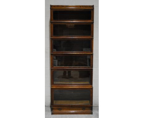 An antique Globe Wernicke style bookcase with single drawer under - length 86.5cm, depth 35cm, height 224cm