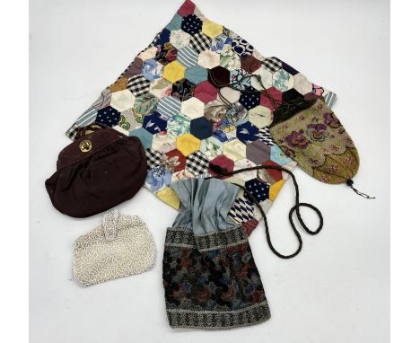 A collection of vintage beadwork purses, bags and quilted cushion cover