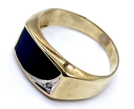 A vintage 9ct (375) gold signet ring set with onyx and diamond accent, size U - 3.5g total weight.