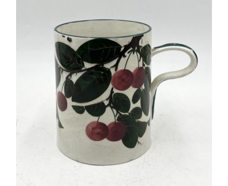 A Wemyss Pottery "cherries" tankard stamped for T. Goode & Co, London - height 15cm