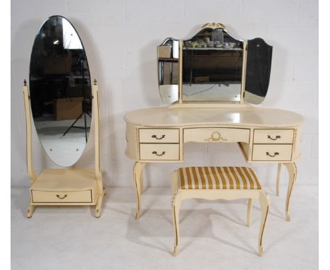 A cream coloured Classical style dressing table, with five drawers, raised on cabriole legs, along with a matching footstool 