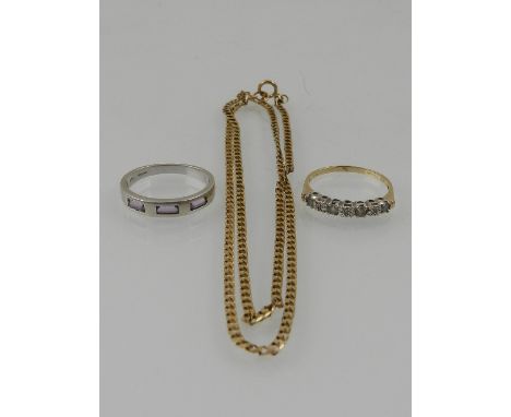 A 9 carat yellow gold, diamond, and aquamarine ring, together with a 9 carat white gold and amethyst ring, and a  9 carat yel