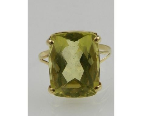A 14 carat yellow gold and citrine cocktail ring. 