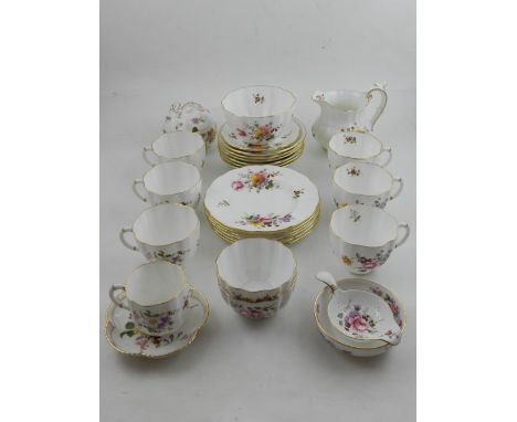 A Royal Crown Derby 'Posies' tea porcelain service, polychrome decorated with posies and having gilt heightened waved rims, t