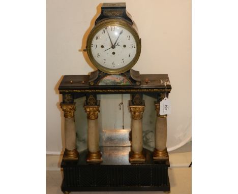 An early 20th century architectural mantel clock, the Roman enamelled dial with outer minute track and set subsidiary date di