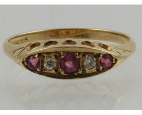 A 9 carat yellow gold, pink sapphire, and diamond set five stone ring.