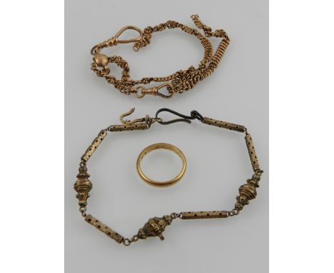 A yellow metal Albert chain, together with a yellow metal ring, and a further watch chain. 