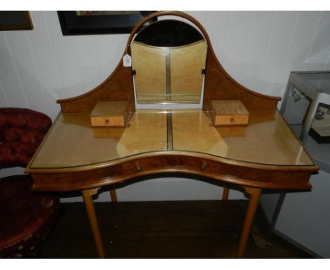 A Contemporary maple dressing table, ebony inlaid, having two drawers to glazed top and one small drawer to centre, with moth