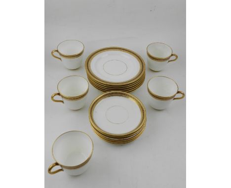 A 19th century four piece tea service, having gilt and Greek key borders.