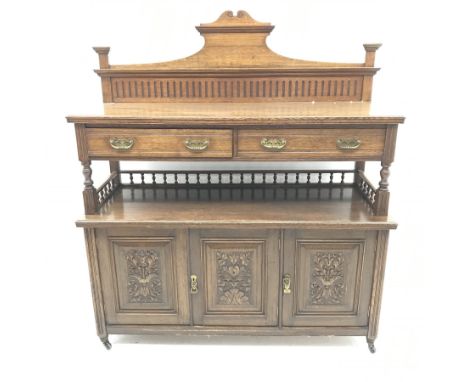 Edwardian oak sideboard, raised shaped back, two drawers above galleried shelf, three carved cupboard doors, W138cm, H155cm, 