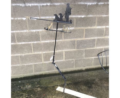 Wrought metal weather vane with hunting scene pediment, H165cm (overall) a hay rack, flower rack and two wall holders  - Cond