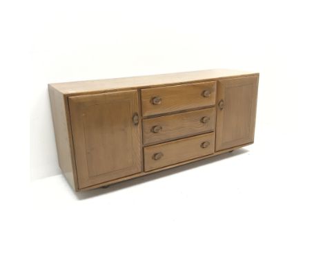 Ercol light elm sideboard, three drawers flanked by two cupboards, E156cm, H69cm, D47cm - Condition Report 