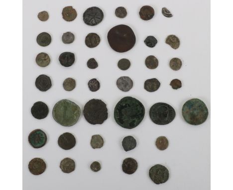 A large selection of Roman coinage, including Hadrian Quadrans, Constantine, Magnentius, Valens, Julian II, Marcus Aurelius S