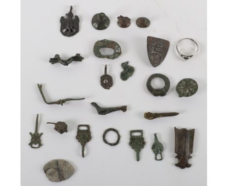 Saxon and later antiquities, including a Saxon disc brooch, Roman/Saxon pheasant bird brooch, Celtic terret ring, Saxon stirr