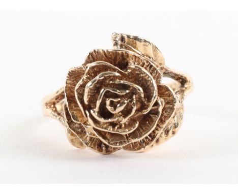 A gold flower ring, untested but assumed 18ct, hallmarks rubbed, 4g