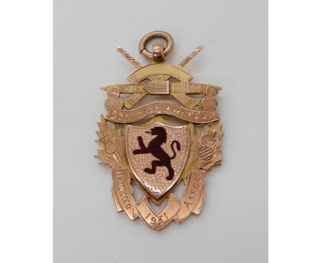 A 9ct gold and enamel Scottish Amateur Rowing Association medallion circa 1931, weight approx 8.4gms Condition Report: Availa