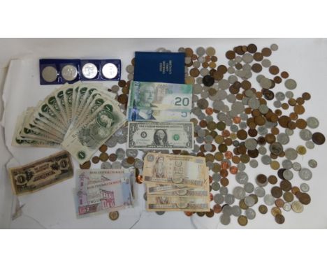 A lot comprising twenty Bank of England one pound notes, L. K. O'Brien with a quantity of foreign banknotes, Canada etc, a GB