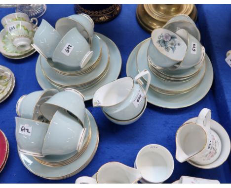 A Royal Worcester Woodland pattern teaset comprising ten cups, twelve saucers, plates, two cake plates, milk jug and sugar bo