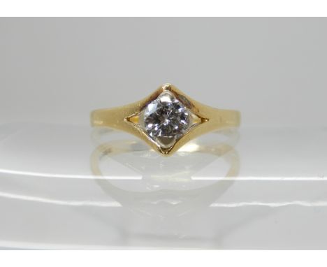 An 18ct gold diamond ring, set with an estimated approx 0.20ct brilliant cut diamond, size K, weight 2.5gms Condition Report: