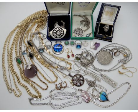 An Ortak silver and enamel leaf pendant, a silver ingot pendant, silver chains, gem set rings etc Condition Report: Not avail