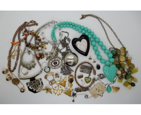 A silver Iona marble heart pendant, a silver moonstone necklace, a Celtic bracelet with animal shaped finials, a gold plated 